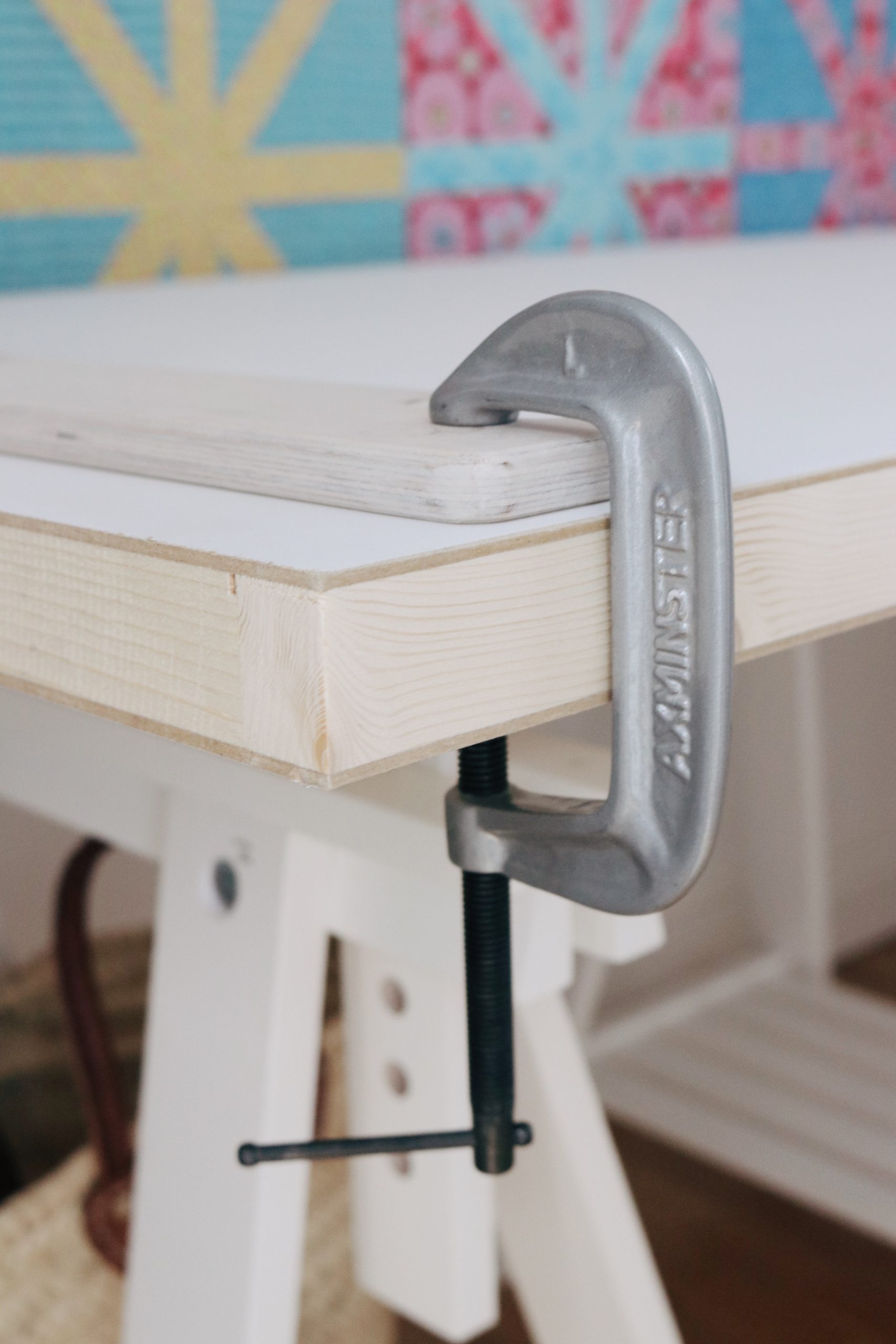 Machine Quilter frames clamp to the table