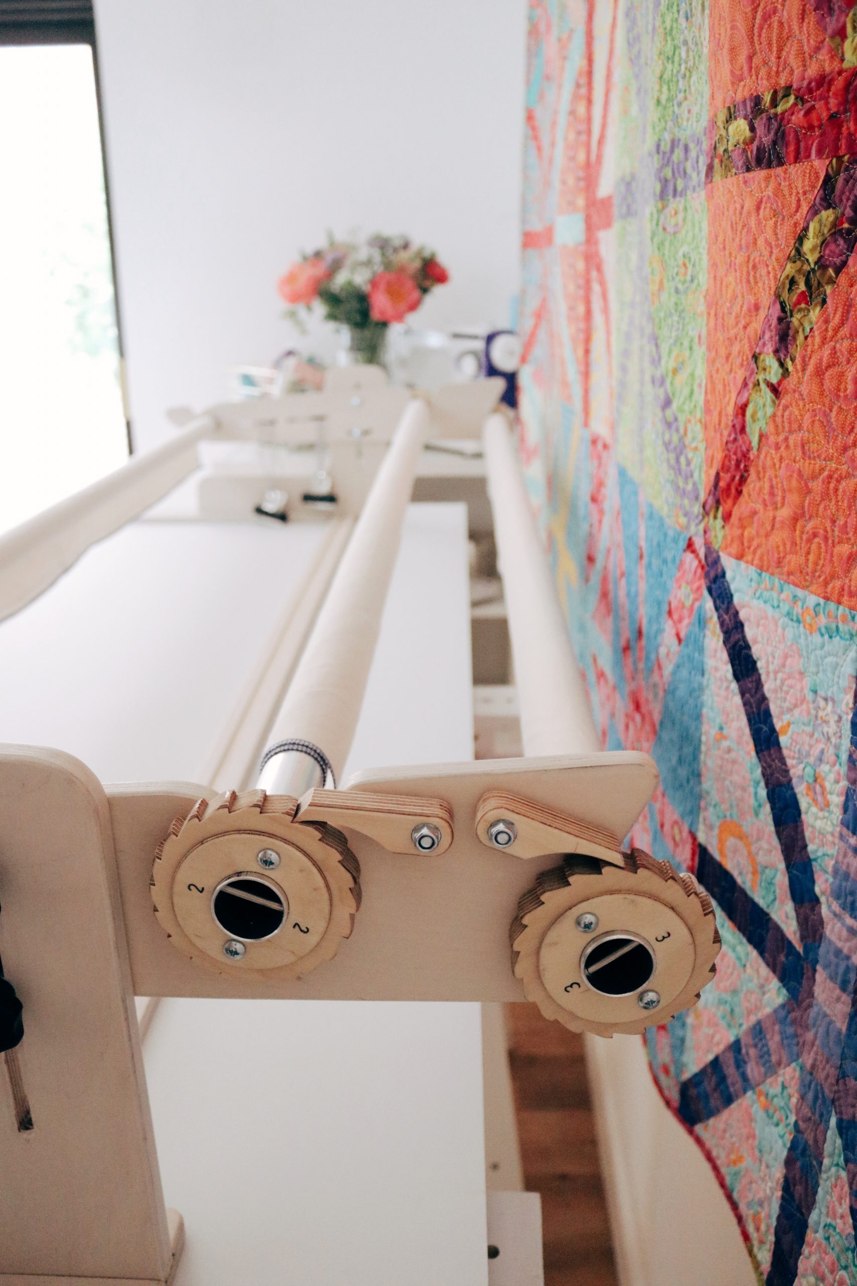 Beautiful end pieces and pole design updated to allow you to move seamlessly between quilting frame sizes.