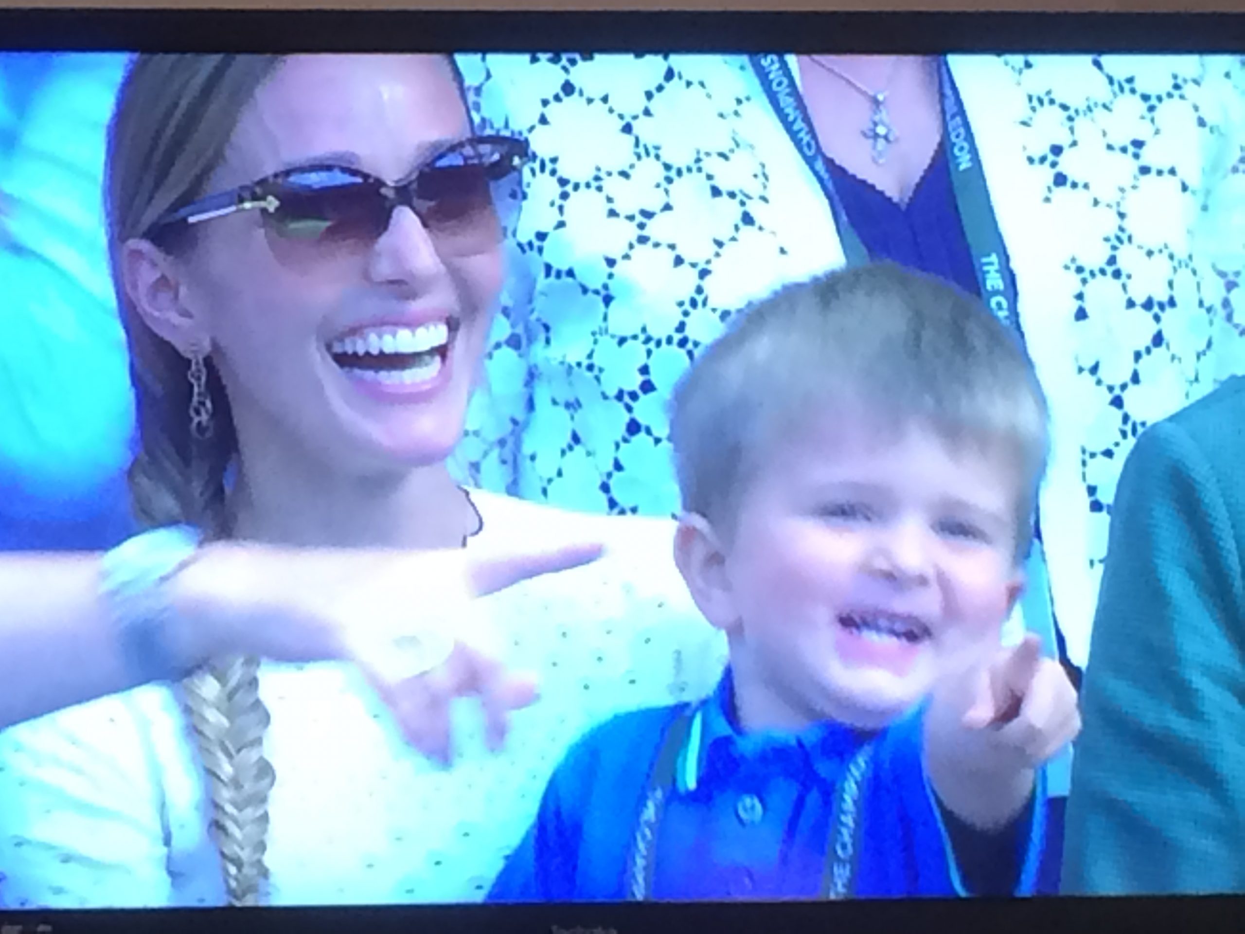 Djokovic's wife and son applauding